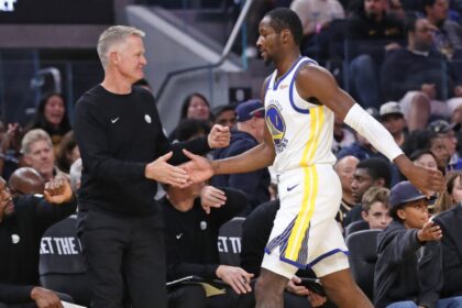 Golden State Warriors head coach Steve Kerr claps hands with Jonathan Kuminga during the second quarter of the Dubs' 111-103 win over the Los Angeles Lakers during a preseason NBA game at Chase Center in San Francisco, Sunday, Oct. 5, 2025.