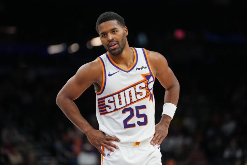 Jared Butler #25 of the Phoenix Suns watches the second half of a preseason NBA game against the Los Angeles Lakers at Mortgage Matchup Center on October 14, 2025 in Phoenix, Arizona.