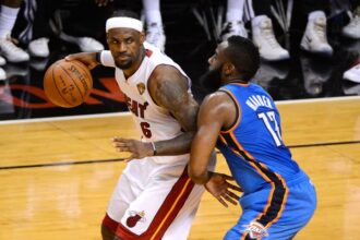 No. 6 LeBron James of the Miami Heat faces No. 13 James Harden of the Oklahoma City Thunder during Game 4 of the 2012 NBA Finals on June 19, 2012 at American Airlines Arena in Miami, Florida.