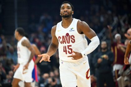 Donovan Mitchell #45 of the Cleveland Cavaliers celebrates during the first quarter of a preseason game against the Detroit Pistons at Rocket Arena on October 14, 2025 in Cleveland.