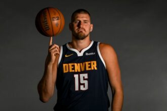Nikola Jokic (15) of the Denver Nuggets poses for a portrait at the team's media day.