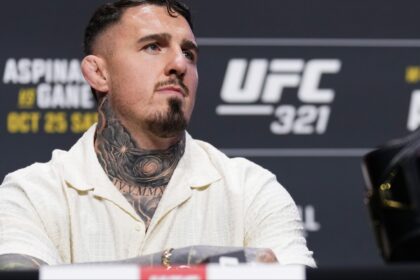 Tom Aspinall appears at a pre-fight press conference for UFC 321