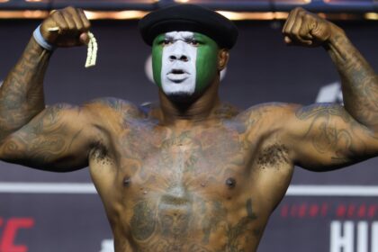 Mohammed Usman poses on the scale during the UFC Baku ceremonial weigh-in