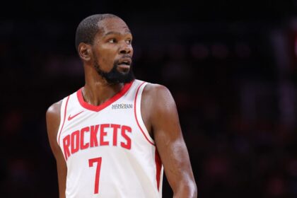 Houston Rockets No. 7 Kevin Durant watches the first half of the preseason game against the Utah Jazz at Toyota Center.