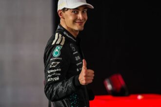 Wolff claims that "formality" Russell's contract is near