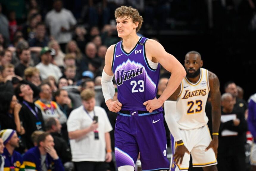 Lauri Markkanen #23 of the Utah Jazz reacts after missing a shot during the second half of the game against the Los Angeles Lakers at Delta Center.