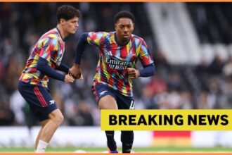 Myles Lewis-Skelly warming up for Arsenal