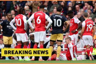 Martin Odegaard nurses an injury during Arsenal vs West Ham