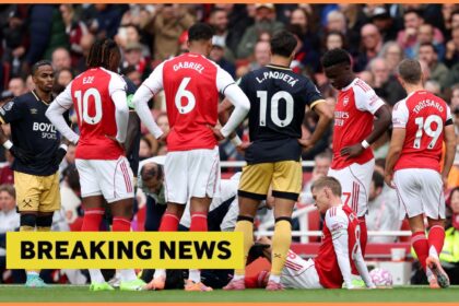 Martin Odegaard nurses an injury during Arsenal vs West Ham