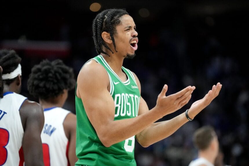 Boston Celtics #8 Josh Minott reacts during the fourth quarter against the Detroit Pistons at Little Caesars Arena on October 26, 2025 in Detroit, Michigan.