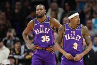 Kevin Durant #35 and Bradley Beal #3 of the Phoenix Suns during the second half of an NBA game at Footprint Center on January 12, 2025