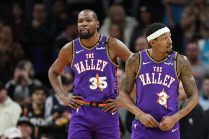Kevin Durant #35 and Bradley Beal #3 of the Phoenix Suns during the second half of an NBA game at Footprint Center on January 12, 2025