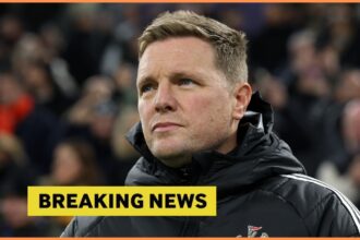 Newcastle manager Eddie Howe looks on