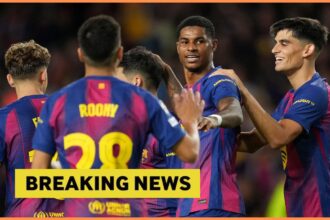Marcus Rashford celebrates with his Barcelona teammates