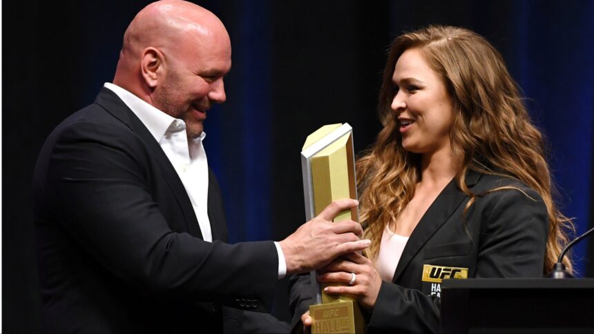 Dana White presents Ronda Rousey with an award at the 2018 UFC Hall of Fame induction ceremony