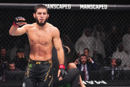 Islam Makhachev celebrates victory