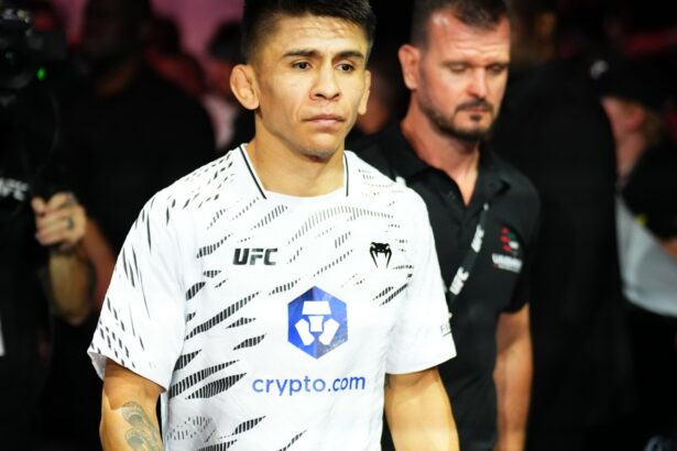 Mario Bautista walks to the Octagon for his fight at UFC 321