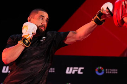 Robert Whittaker hits mitts at UFC practice