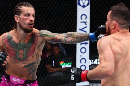 Sean O'Malley punches Merab Dvalishvili during their fight at UFC 316