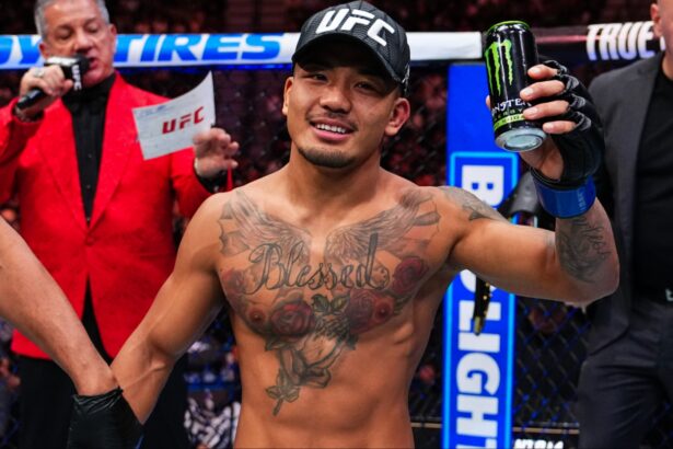 Joshua Van celebrates as the official decision is read at UFC 323