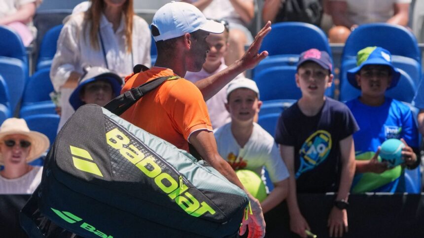 7th seed Felix Auger-Aliassime returns vs. Nuno Borges