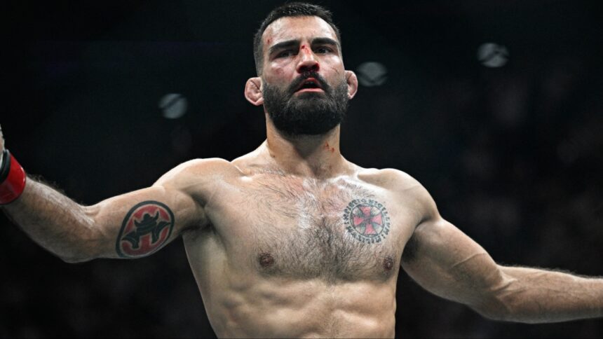 Benoit Saint-Denis celebrates after defeating Mauricio Ruffy at UFC Paris