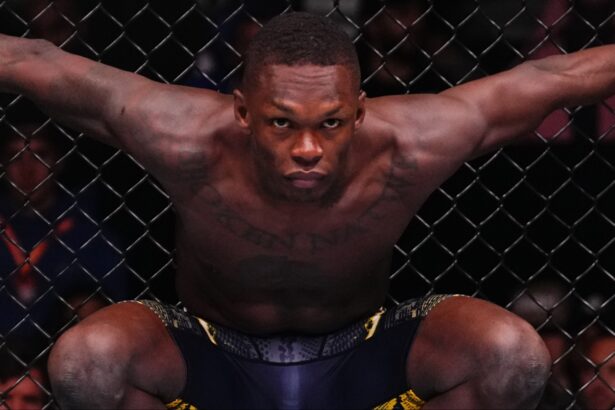 Israel Adesanya stares down his opponent in the Octagon at UFC Saudi Arabia