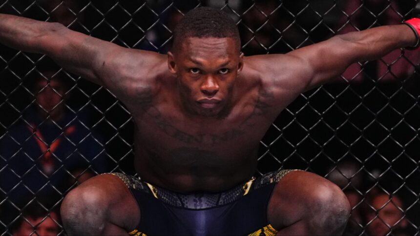 Israel Adesanya stares down his opponent in the Octagon at UFC Saudi Arabia