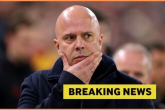 Arne Slot looks on and