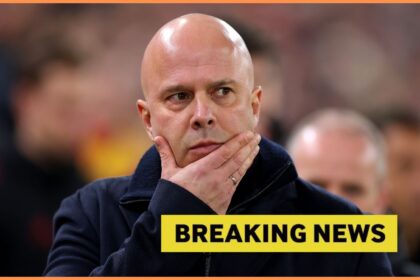 Arne Slot looks on and