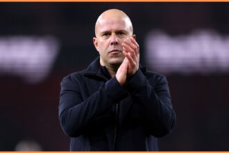 Liverpool manager Arne Slot applauds the fans after the Arsenal game