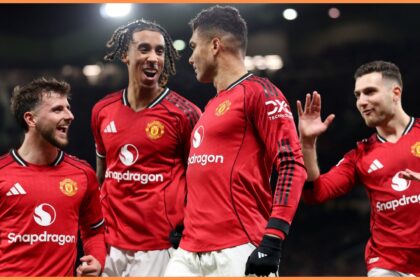 Diogo Dalot celebrates with his Manchester United teammates