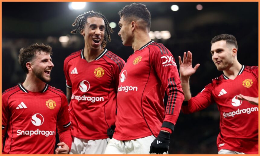 Diogo Dalot celebrates with his Manchester United teammates