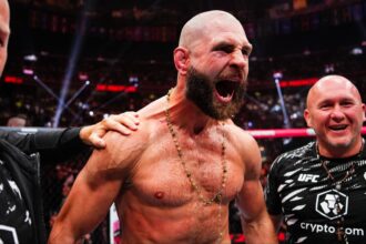 Jiri Prochazka celebrates his win with his team at UFC 320