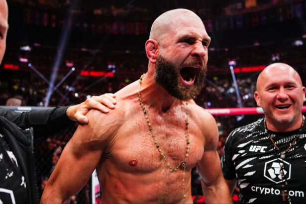 Jiri Prochazka celebrates his win with his team at UFC 320