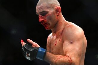 Sean Strickland reacts in between rounds during his fight at UFC 312
