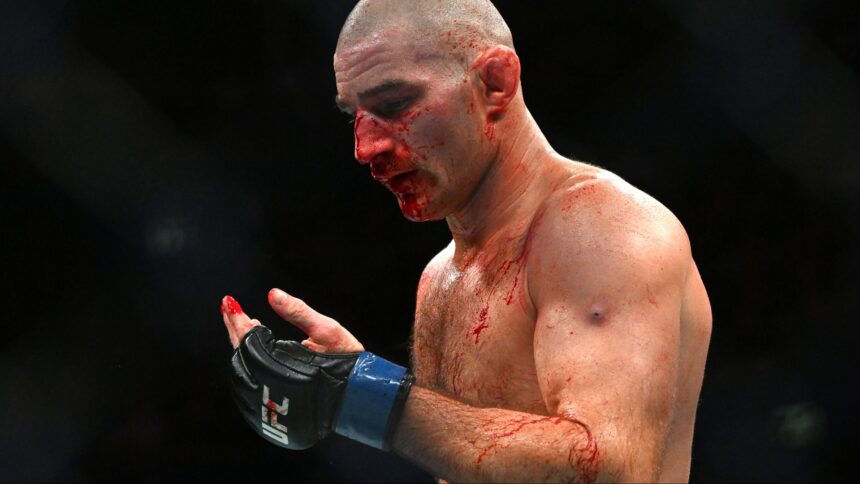 Sean Strickland reacts in between rounds during his fight at UFC 312