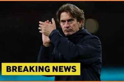 Tottenham manager Thomas Frank applauding fans with overlay of Breaking News