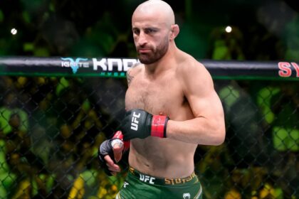 Alexander Volkanovski enters the Octagon for his fight at UFC 325