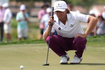 Austin Smotherman lifts Cognizant to a three-point lead. Cut by Brooks Koepka