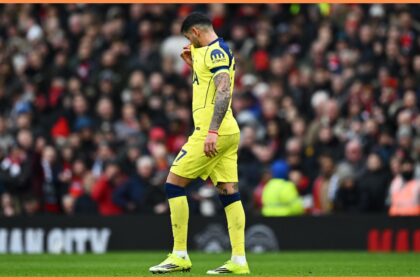 Cristian Romero walking off after his red card for Tottenham vs Manchester United