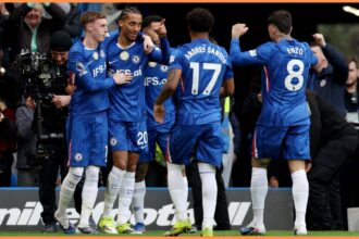 Cole Palmer celebrates with his Chelsea teammates