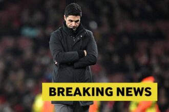 Mikel Arteta looking down with overlay of Breaking News