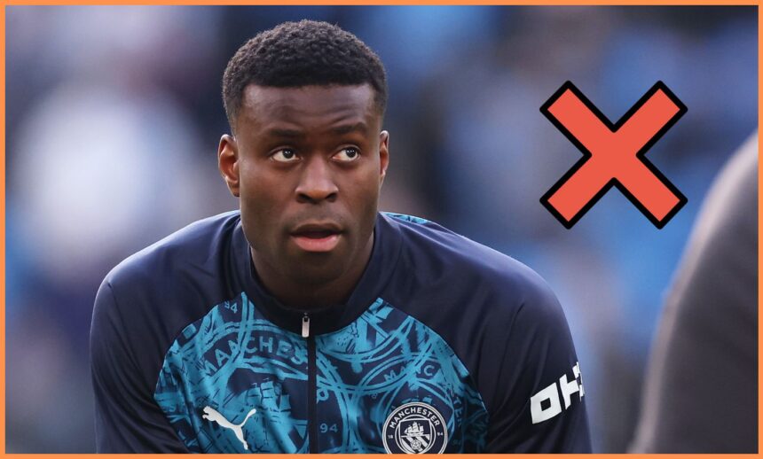 Marc Guehi warming up for Manchester City