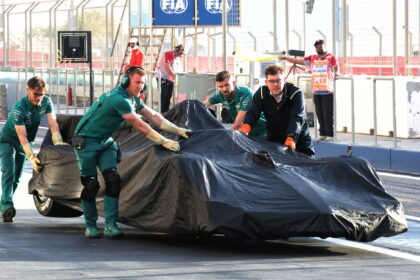 Fernando Alonso's Aston Martin is recovered