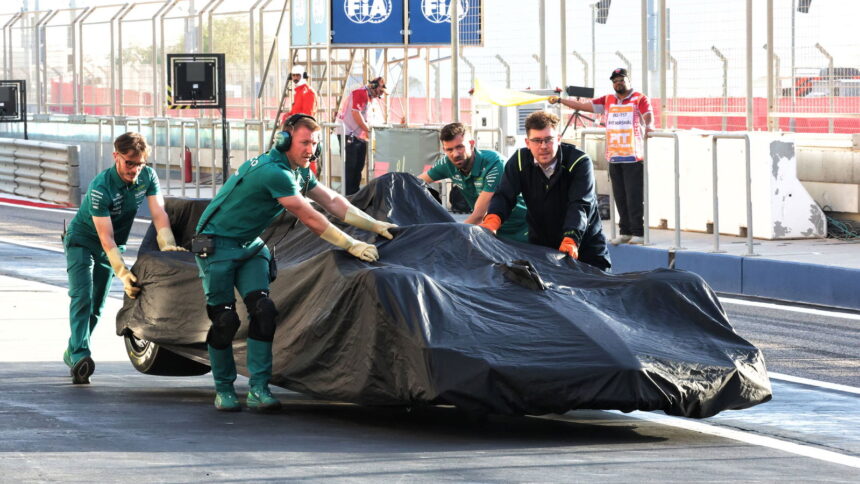 Fernando Alonso's Aston Martin is recovered