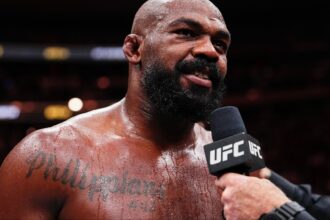 Jon Jones speaks with Joe Rogan after UFC 309