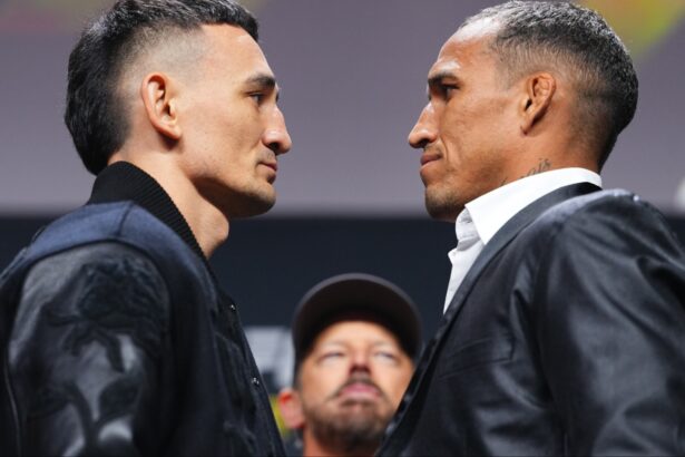 Max Holloway and Charles Oliveira face off at a press conference
