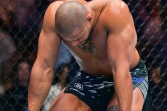 Ciryl Gane reacts after his fight against Tom Aspinall is ruled a no contest