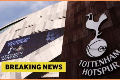 Tottenham badge and outside stadium view with breaking news overlay